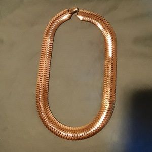 Gold tone slinky choker
